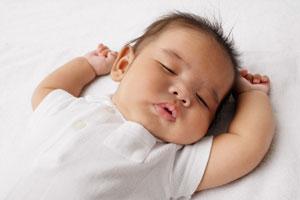 Baby sleeping in crib